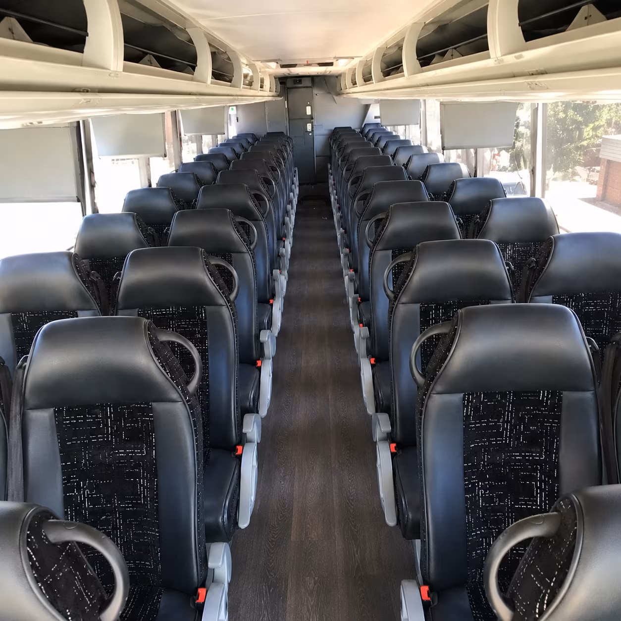 lansing 56 passenger charter bus inside