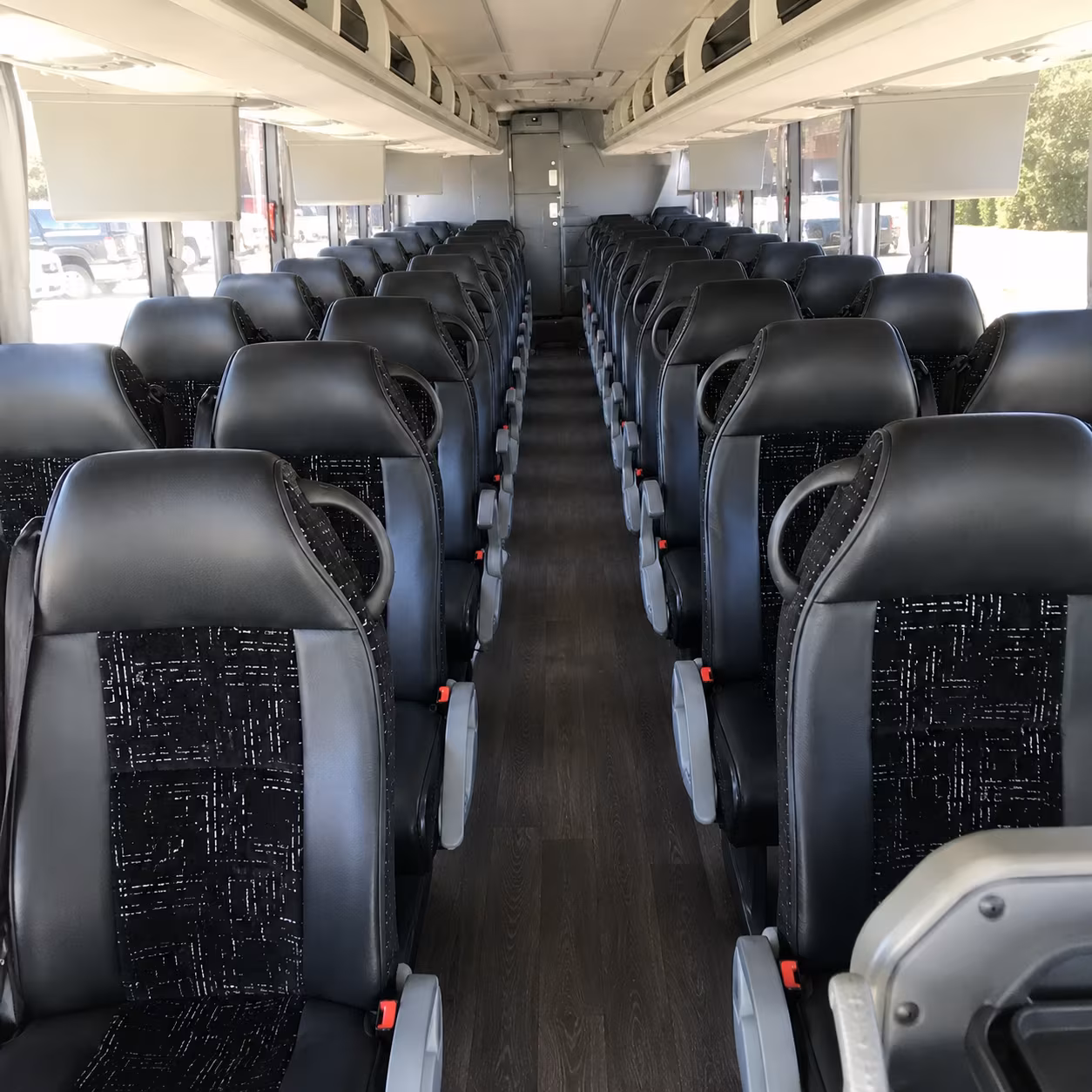 lansing charter bus rentals for long distance trips to detroit and beyond
