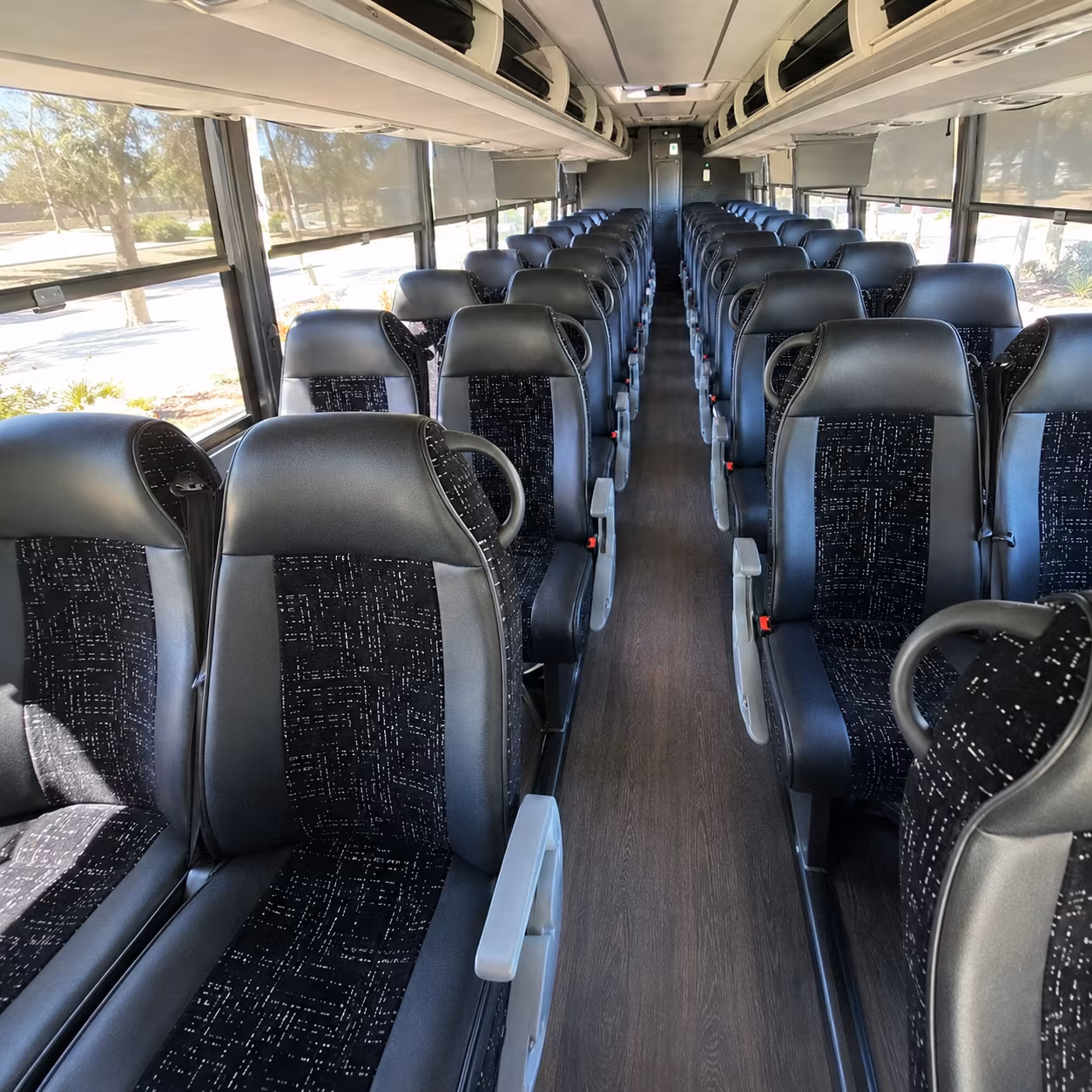 large group charter buses for lansing tradeshows and multi day corporate travel