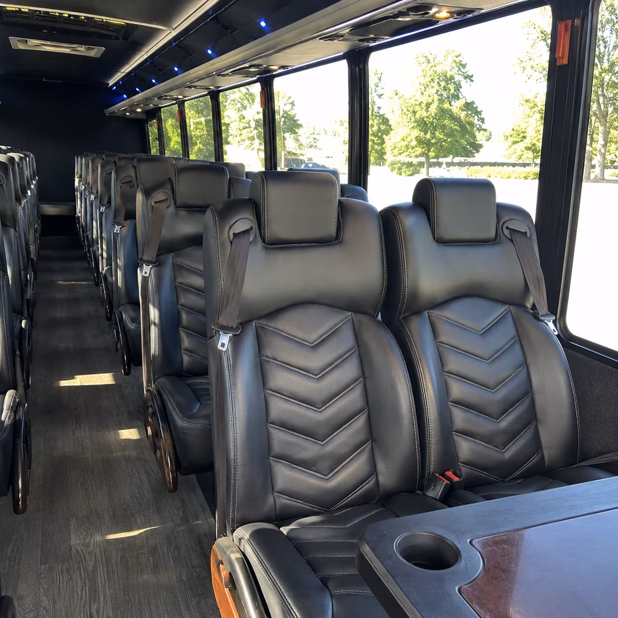 shuttle buses for wedding guests between lansing hotels and your venue